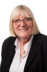A picture of Councillor Linda Chambers a white middle aged woman with long blonde hair and wears glasses.