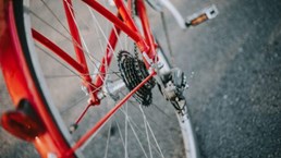 Red Bicycle showing gears and tyre